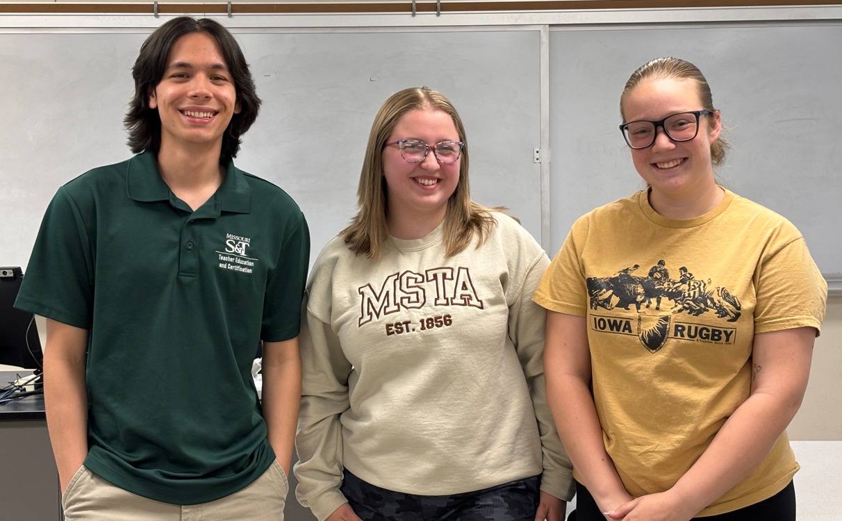 3 S-MSTA student officers smiling